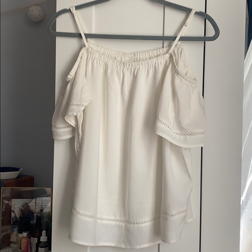 Creamy white color blouse